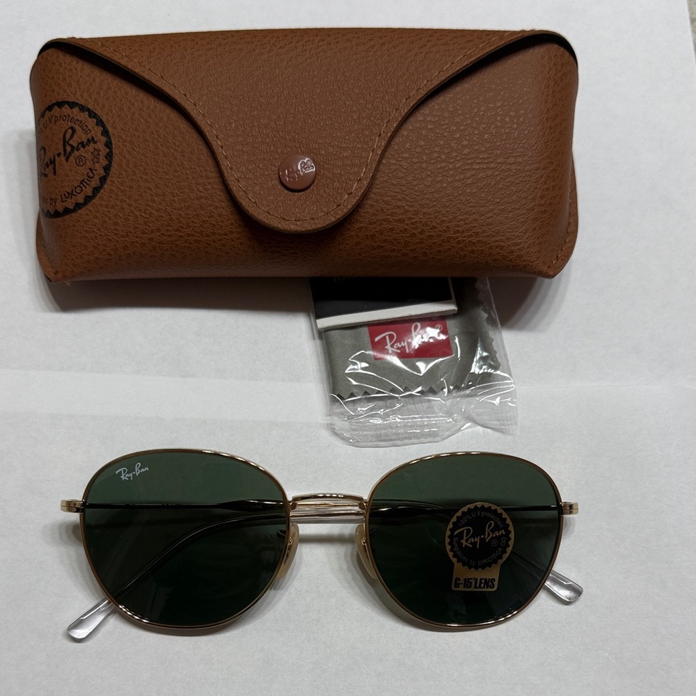Ray-Ban RB 3809 Classic Gold Frame with G-15 Lenses.